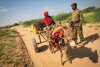 Somalia, donkey cart, woman, soldier, peacekeeping, AMISOM